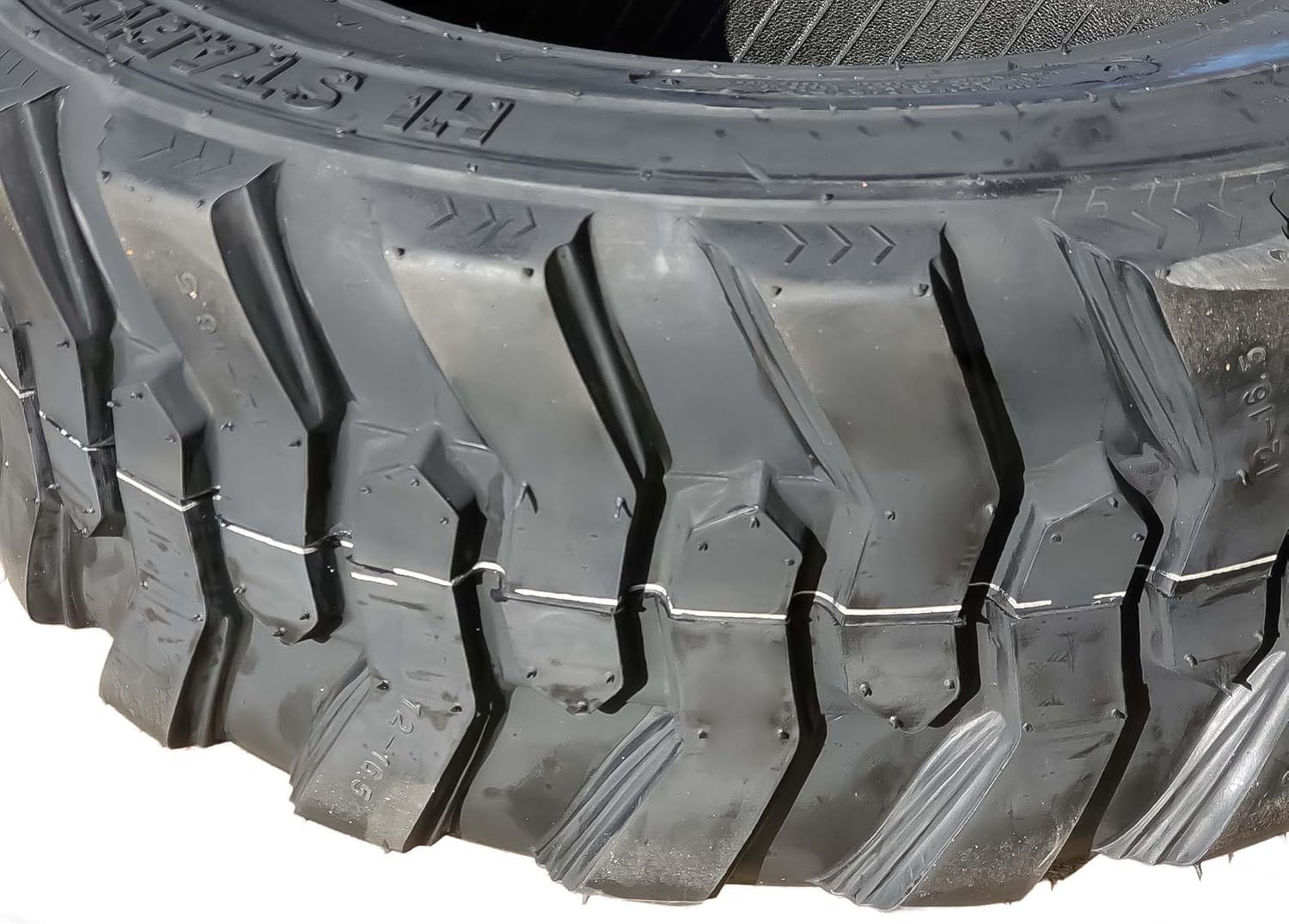 12-16.5 12 Ply Skid Steer Tire with Rim Guard Z594