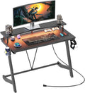 Gaming Desk with Power Outlets & Music Strip Lights, Large Monitor Stand Z617